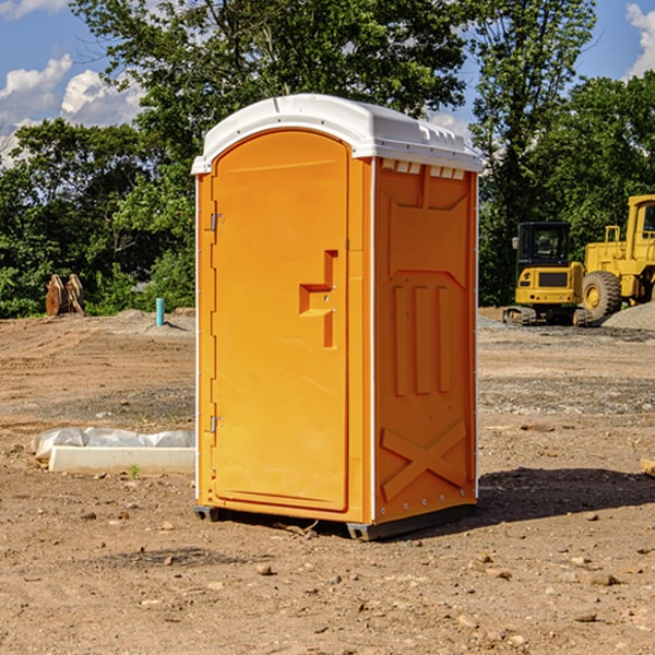 what is the cost difference between standard and deluxe portable restroom rentals in Devers